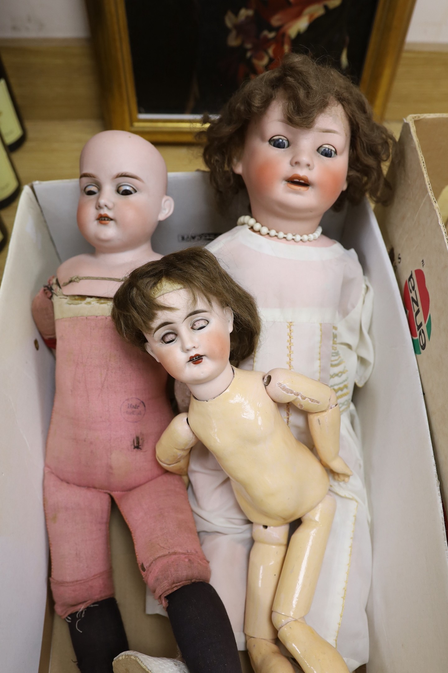 A collection of six 19th and 20th century various dolls